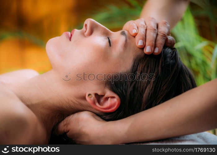 Craniosacral Therapy Massage. Therapist Massaging Woman&rsquo;s Forehead.