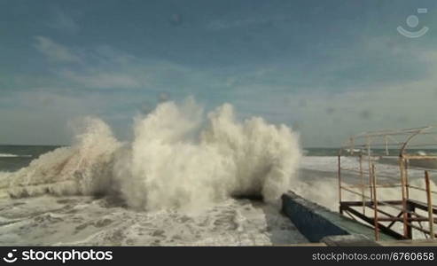 Crashing Stormy Waves On Embankment