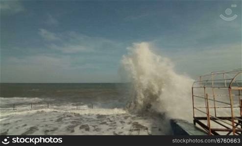 Crashing Stormy Waves On Embankment