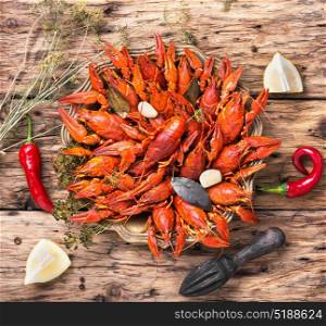 crayfish in a metal dish. prepared crayfish with spices on a stylish tray
