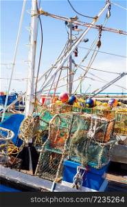 Crayfish nets and traps on a small fishing boat in Kalk Bay Harbour Cape Town
