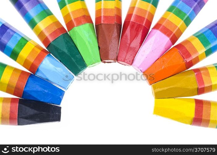 Crayons in different colors on white background