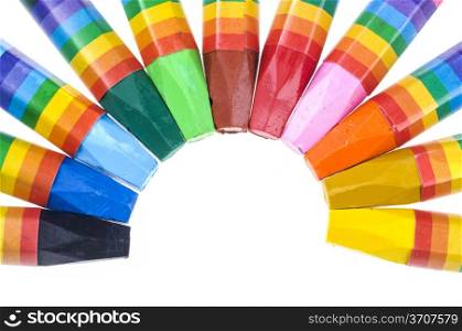 Crayons in different colors on white background