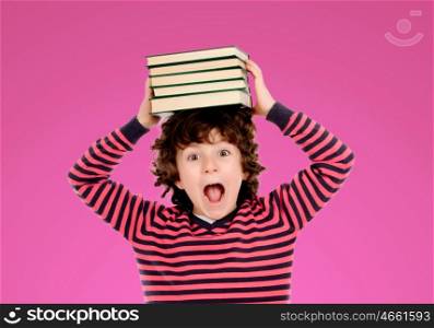 Crazy boy with many books on the head isolated on a white background