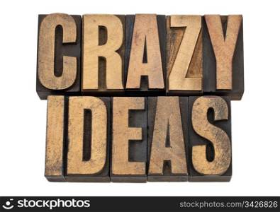 crazy ideas - creativity concept - isolated text in vintage letterpress woodtype