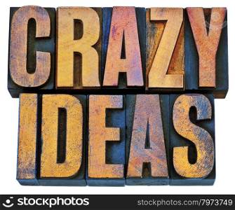 crazy ideas - creativity concept - isolated text in vintage letterpress woodtype printing blocks