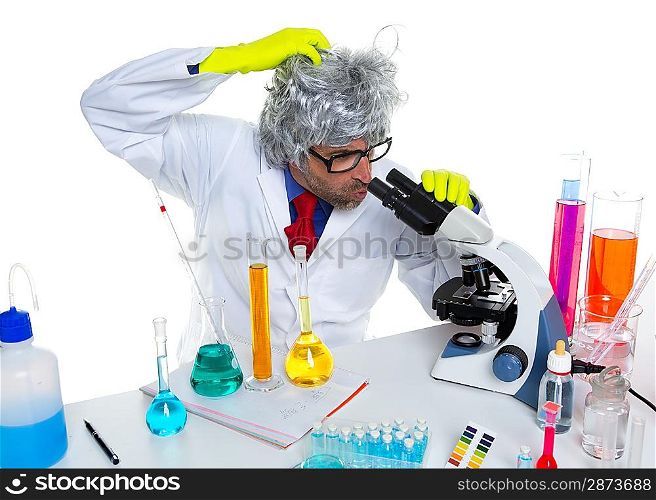 Crazy mad nerd scientist at laboratory microscope thinking gesture