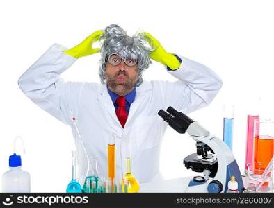Crazy mad nerd scientist funny expression at laboratory on chemical experiment