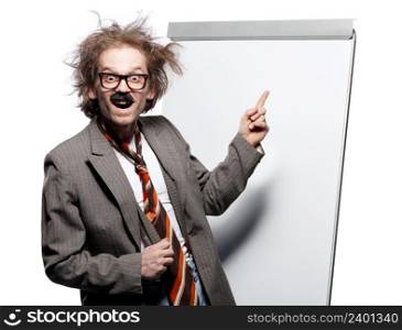 Crazy professor / scientist / lecturer with mad hairstyle wearing horn rimmed glasses and fake mustache standing in front of a whiteboard and pointing it with happy goofy face