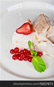 cream berries dessert. cream dessert with berries cranberries and strawberry