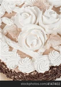 Cream cake closeup isolated on a white