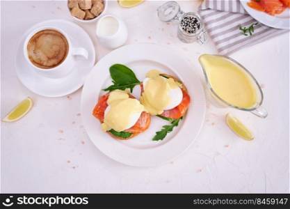Cream cheese, Smoked salmon and poached egg toasts on a plate.. Eggs Benedict with Cream cheese and Smoked salmon on a plate