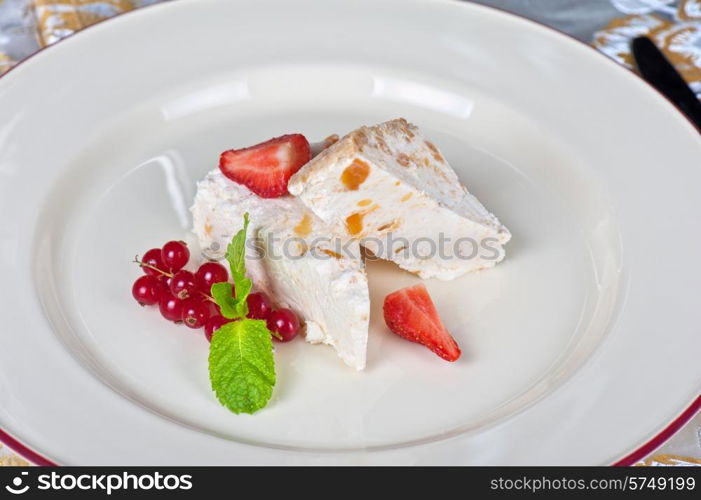 cream dessert with berries cranberries and strawberry. cream berries dessert