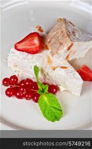 cream dessert with berries cranberries and strawberry. cream berries dessert