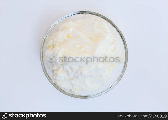 cream isolated in a glass bowl.