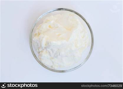 cream isolated in a glass bowl.