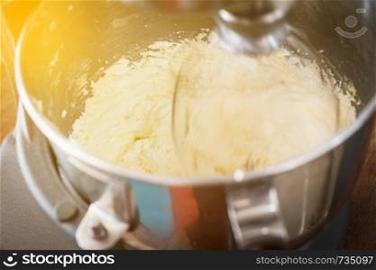 Cream making for home-made butter cakes on a mixer machine