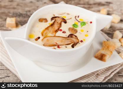Cream of mushroom soup. Bowl of cream of mushroom soup