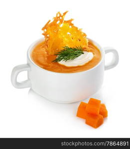 Cream of pumpkin soup with parmesan crisps isolated