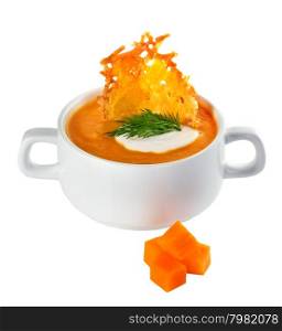 Cream of pumpkin soup with parmesan crisps isolated