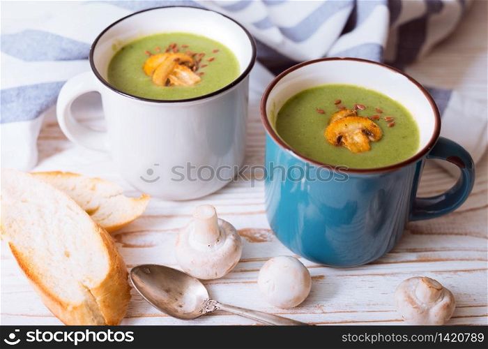 cream soup with mushrooms in a cups