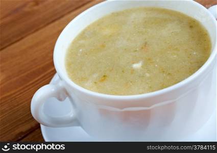 Creamy cabbage and sorrel soup with sour cream