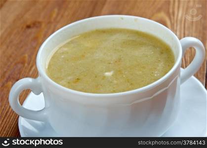 Creamy cabbage and sorrel soup with sour cream