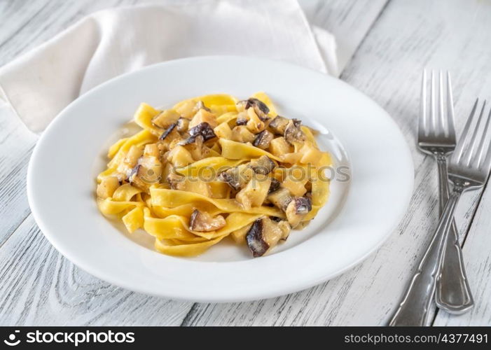 Creamy garlic eggplant and parmesan tagliatelli pasta