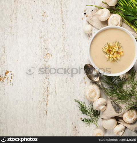 Creamy Mushroom Soup on white rustic background