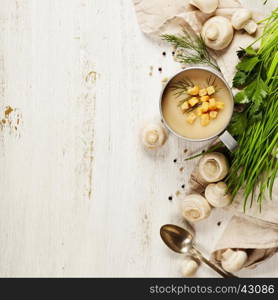 Creamy Mushroom Soup on white rustic background