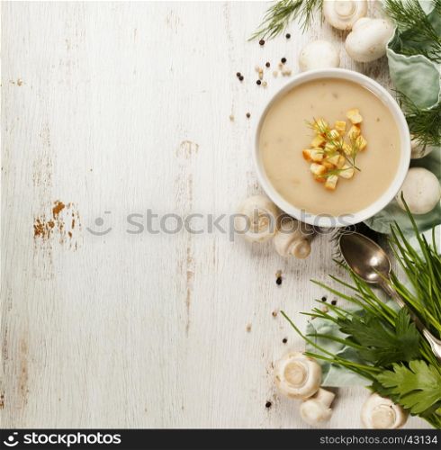 Creamy Mushroom Soup on white rustic background