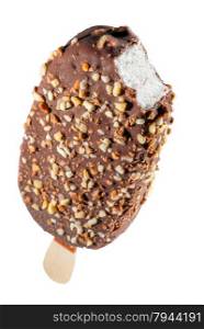 creamy popsicle in dark chocolate with nuts on a white background