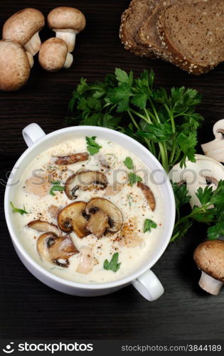 creamy soup pureed mushrooms and slices of chicken