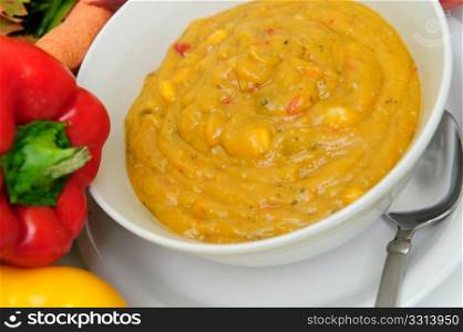 Creamy Vegetable Soup. Hot vegetable soup for a fall day with fresh vegetables on the side.