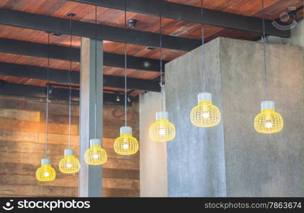 Create bulb light hanging from ceiling, stock photo