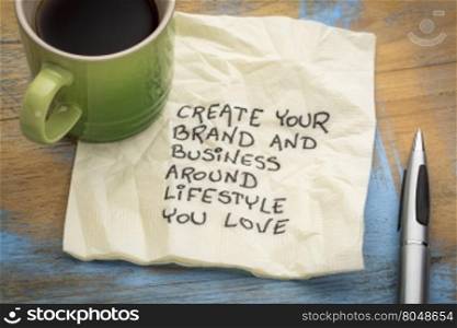 create your brand and business around lifestyle you love - handwriting on a napkin with a cup of coffee