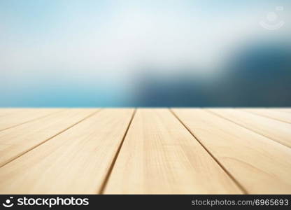 Creative abstract color retro background with wooden lumber planks or timber boards outdoors with selective focus effect and blurred natural background with bokeh