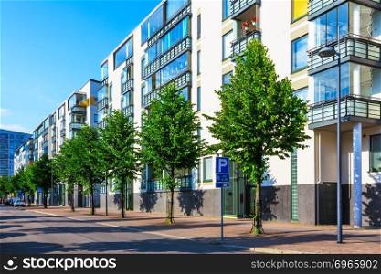 Creative abstract house building and city construction industry concept  summer outdoor urban view of urban city street with modern real estate homes