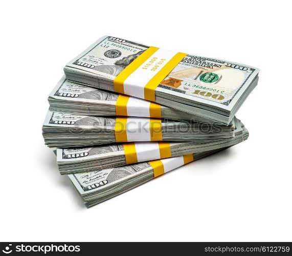Creative business finance making money wealth success concept - stack of bundles of 100 US dollars 2013 edition banknotes bills isolated on white. Bundles of 100 US dollars 2013 edition banknotes