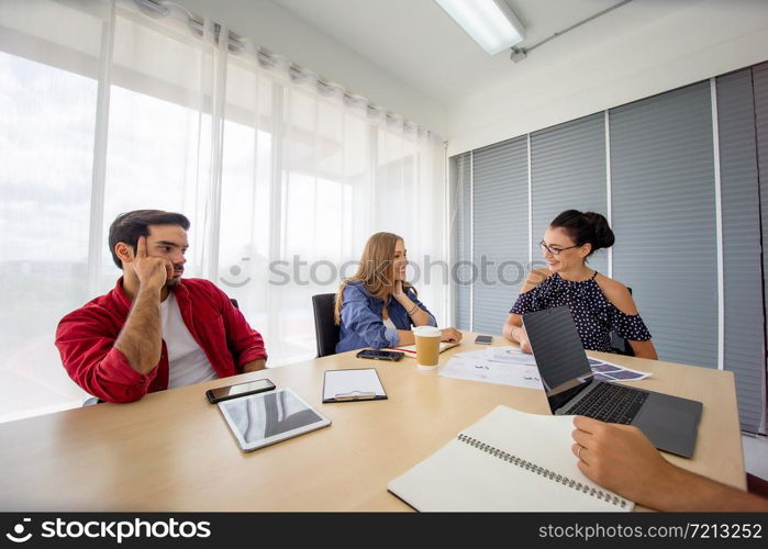 Creative business people working in start up office,modern creative and design worker concept, Group Of Asian and Multi-ethnic Business people with casual suit talking and brainstorming