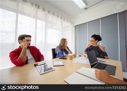 Creative business people working in start up office,modern creative and design worker concept, Group Of Asian and Multi-ethnic Business people with casual suit talking and brainstorming