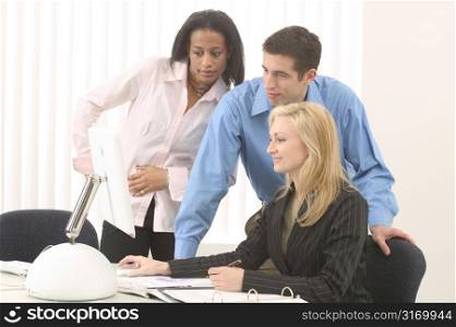 Creative Business Team Working On A Desktop Computer