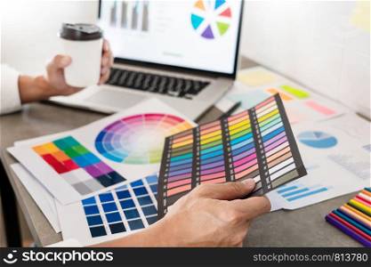 Creative businessman Graphic designer do his work at desk Consulting and business planning