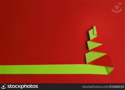 Creative Christmas tree formed from colored paper