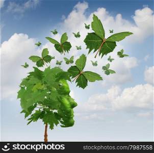 Creative communication and intelligent marketing concept as a tree shaped as a human head with flying leaves turning into magical leaf butterflies spreading the message and sharing the innovative thoughts and imagination.