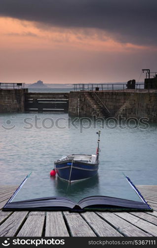 Creative concept pages of book A traditional Cornish fishing village before sunrise in Cornwall England. A traditional Cornish fishing village before sunrise in Cornwall England