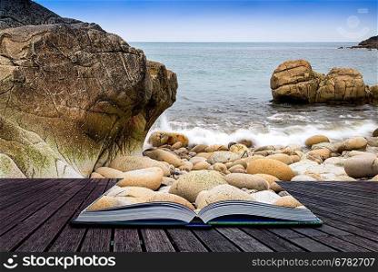 Creative concept pages of book Beautiful landscape of Porth Nanven beach Cornwall England