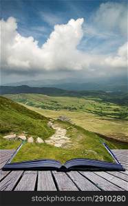 Creative concept pages of book View from Cadair Idris looking North towards Dolgellau over fields and countryside landscape
