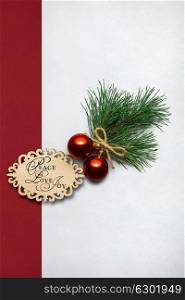 Creative concept photo of christmas decorations with sign on white red background.