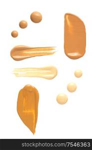 Creative concept photo of cosmetics swatches beauty products foundation cream on white background.